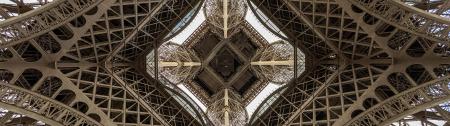 Photo taken from underneath the Eiffel Tower